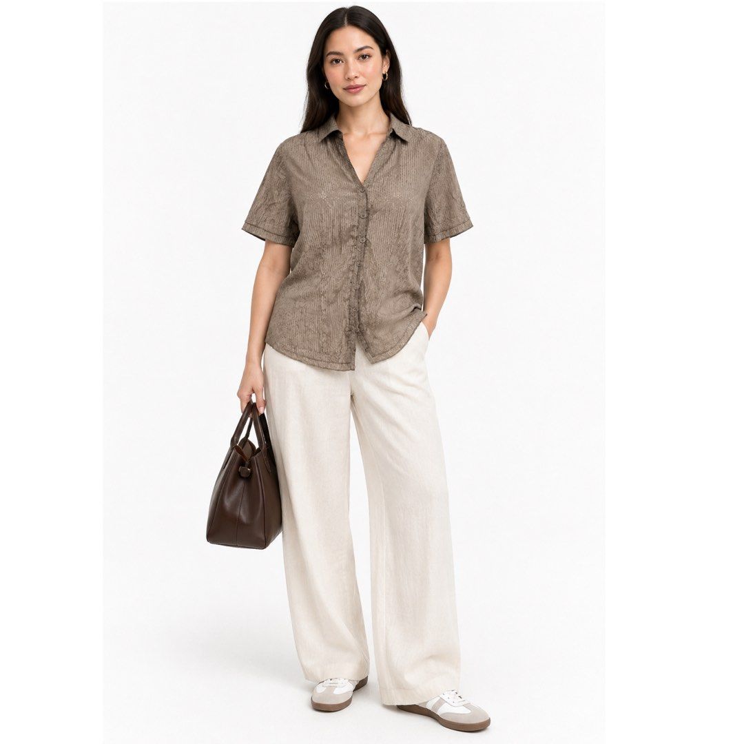 CANDA Taupe Textured Abstract Print Short Sleeve Button Down Blouse Large (Category: Blouses) located in San Jose del Monte. Submitted by vanessabarredo (Listing ID 1460441459, Image 2). Description: CANDA Taupe Textured Abstract Print Button-Down Blouse EXCELLENT CONDITION Elegant CANDA short-sleeve blouse in a muted taupe/mushroom shade with subtle tonal abstract stripe detailing. Features a softly textured crinkled finish, classic collar, tona
