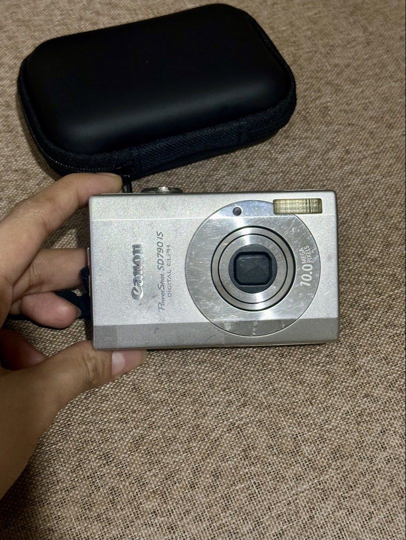 Canon PowerShot SD790 IS Digital Elph Camera Digicam (Category: Cameras) located in Cabanatuan. Submitted by calliethrifts (Listing ID 1460410815, Image 3). Description: Canon PowerShot SD790 IS Digital Elph Camera Digicam 📦 Inclusions: •Canon PowerShot SD790 IS Camera •Wasabi Battery - Add ₱300 •Camera Strap/lanyard •Camera Pouch 📸 Camera Specs: •10.0 Megapixels — captures sharp and detailed photos •3x Optical Zoom — versatile for everyday pho