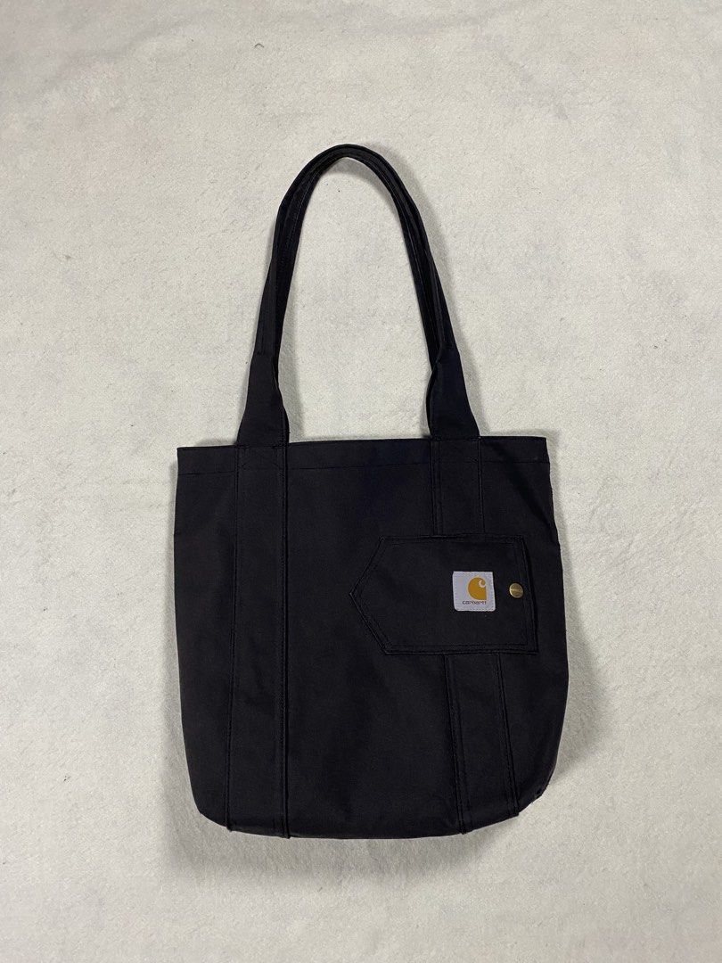 Carhartt Essential Tote bag (Category: Shoulder Bags) located in Dasmarinas. Submitted by ridgeridethrift (Listing ID 1460449559, Image 1). Description: Essential tote bag 8 up /10 color rate Minor stain inside & sign of usage.