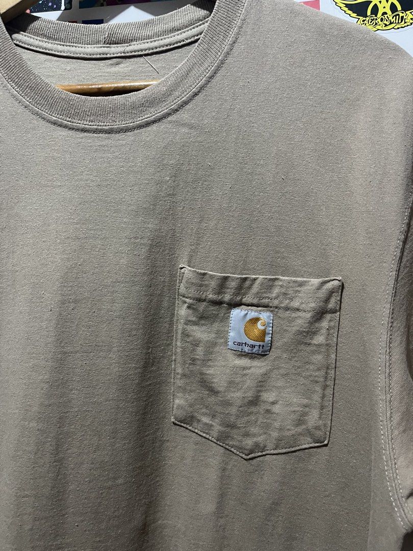 Carhartt K87 Shirt (Category: Tshirts & Polo Shirts ) located in Talisay. Submitted by arabell21 (Listing ID 1460492441, Image 2). Description: Best fit Medium - Large Dimes W22 L30 Color rate 10/10 As new condition Issue pinhole on last pic.