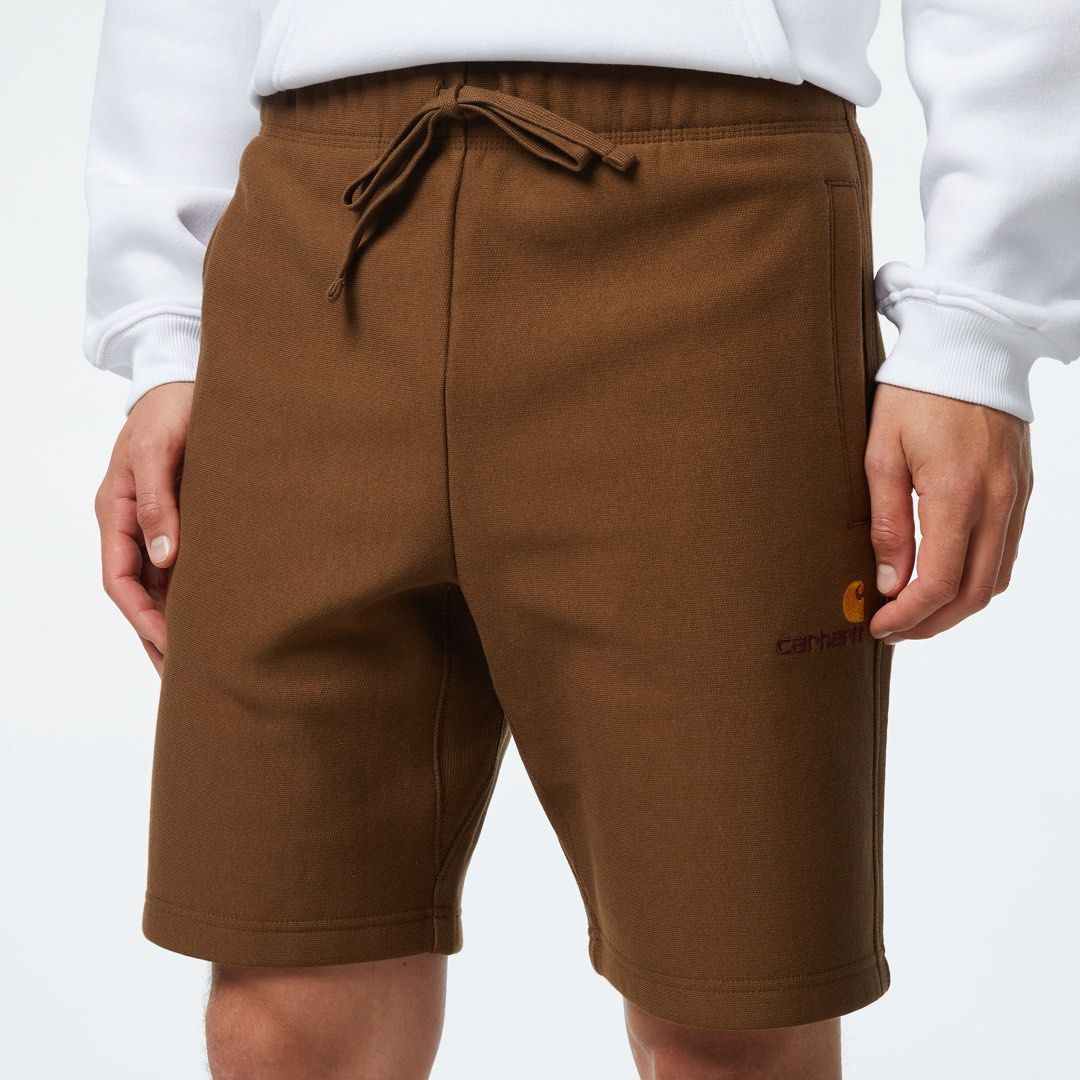 Carhartt WIP American Script Sweat Short (Category: Shorts) located in Manila. Submitted by -handpick- (Listing ID 1460454886, Image 1). Description: Carhartt WIP American Script Sweat Short, featuring an elastic drawstring waist and an embroidered Carhartt logo on the left leg. Size : Small Dimensions : Length : 19.5 inches Inseam : 9 inches Leg opening : 10 inches Thigh : 12 inches Front rise : 12 inches Waistline : 28 to 30 inches (stretched) 