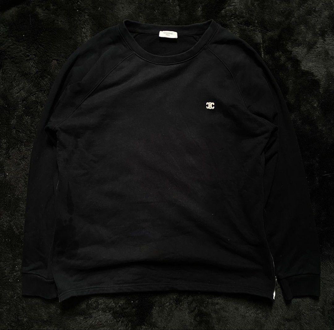Celine Black Crewneck Sweatshirt with Triomphe Logo (Category: Luxury Apparel) located in General Trias. Submitted by thrift_brand_shop (Listing ID 1460344880, Image 1). Description: - Authentic Celine sweatshirt - Color: Black - Iconic Triomphe logo on chest - Side zipper detail - Size: S - Ideal for casual wear.