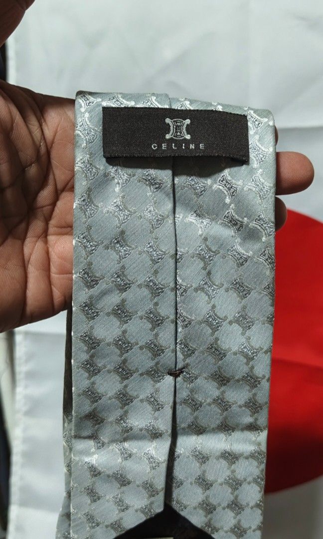 Celine tie (Category: Ties) located in Polomolok. Submitted by dkljapansurplus (Listing ID 1460432387, Image 3). Description: CELINE Ivory Monogrammed Logo Butterfly Silk Kunting linis lang kulang, no major issue In a good condition from japan.