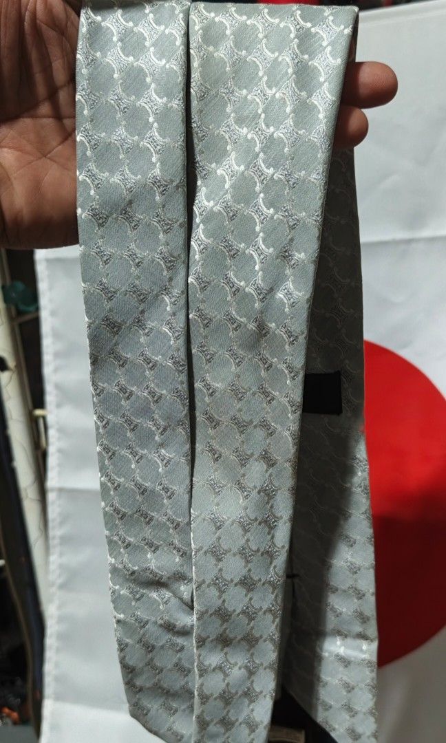 Celine tie (Category: Ties) located in Polomolok. Submitted by dkljapansurplus (Listing ID 1460432387, Image 2). Description: CELINE Ivory Monogrammed Logo Butterfly Silk Kunting linis lang kulang, no major issue In a good condition from japan.
