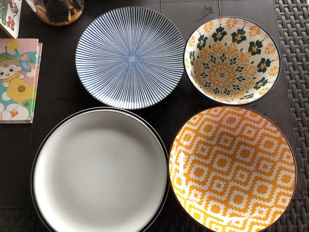 Ceramic Plates and Bowl Set - Patterned (Category: Dinnerware & Cutlery) located in Manila. Submitted by realpagkat02199 (Listing ID 1460310519, Image 3). Description: - Set of 4 ceramic dishes - Includes: 1 large bowl, 1 large plate (yellow zig-zag), 1 medium plate (blue stripes), 1 plain white plate - Ideal for everyday meals or special occasions - Dishwasher and microwave safe - Adds a vibrant touch to your dining table.