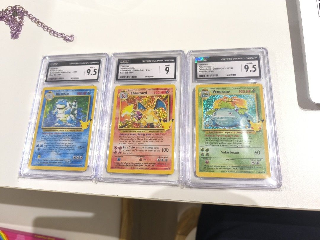 CGC Graded Pokemon Celebrations Charizard, Blastoise, Venusaur (Category: Graded Singles) located in Caloocan City. Submitted by silentdeer.956993 (Listing ID 1460464778, Image 1). Description: - Set of 3 Graded Pokemon Cards - Includes Charizard (CGC 9), Blastoise (CGC 9.5), and Venusaur (CGC 9.5) - From the Celebrations Classic Collection Selling for 18,900 set meet up: SM North to Rob. Magnolia.