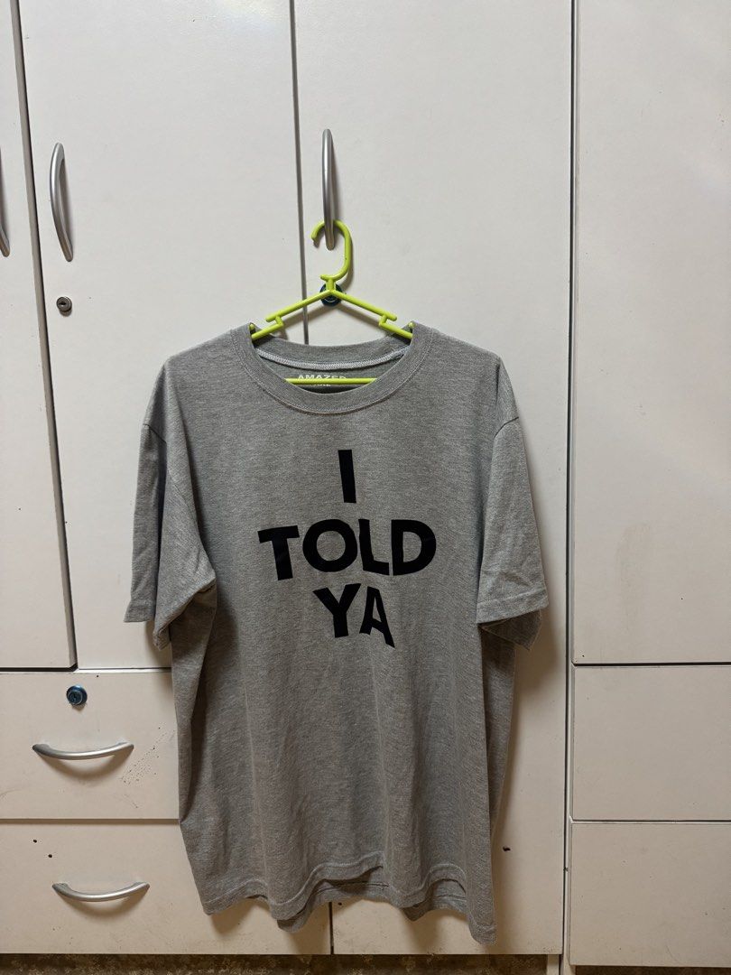 Challengers I TOLD YA Shirt (Category: Tshirts & Polo Shirts ) located in Manila. Submitted by quintessesommerset (Listing ID 1460501690, Image 1). Description: - Grey t-shirt with bold black 'I TOLD YA' graphic print - Classic crew neck and short sleeves - Comfortable and casual design - Ideal for everyday wear - Easily pairs with jeans or shorts.