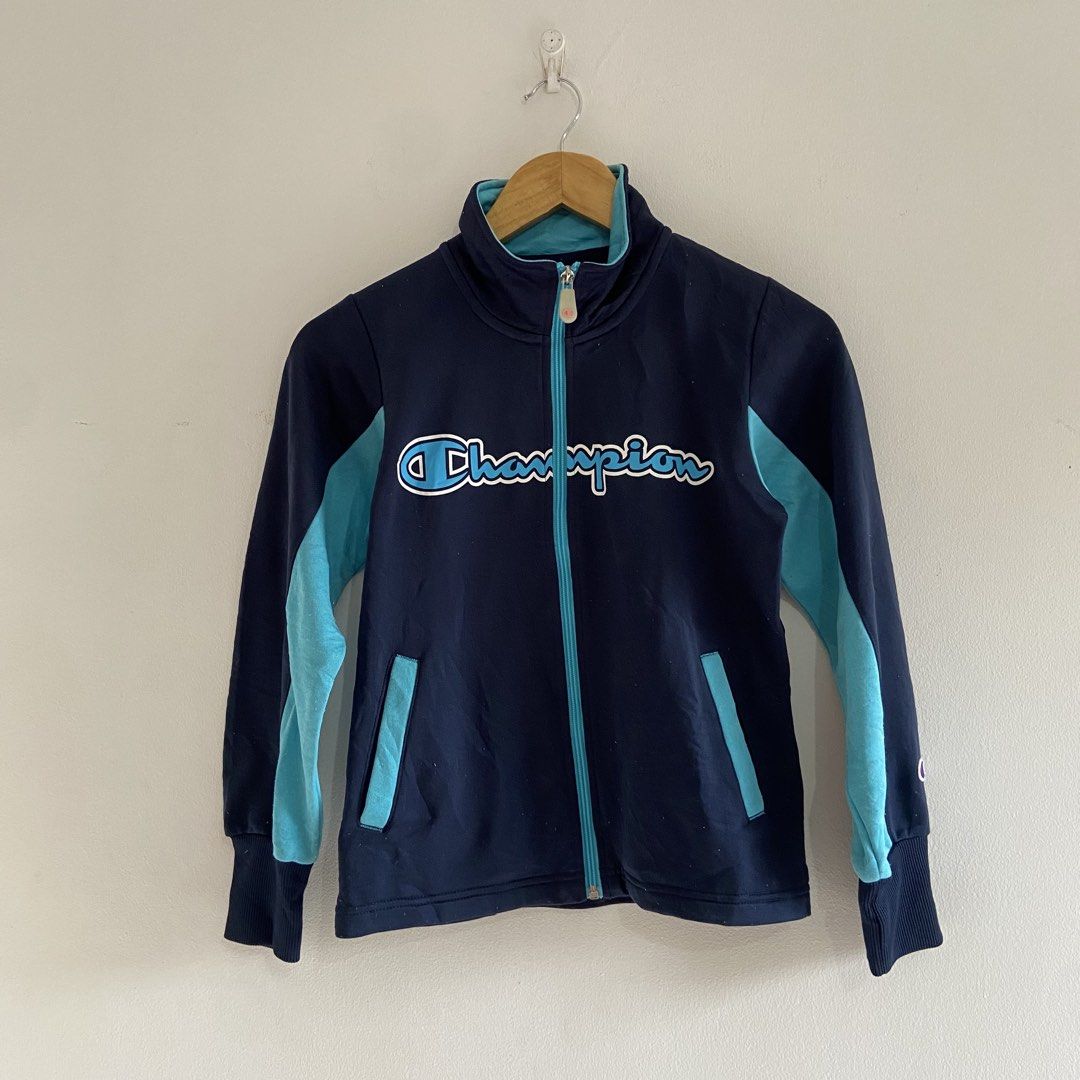 Champion Full Zip Track Jacket (Category: Babies & Kids Fashion) located in Angeles City. Submitted by eriellynnthrifts (Listing ID 1460379628, Image 1). Description: 17x21 Sz 150 on tag Good Condition. See photo for details 270 Angeles City Pampanga.