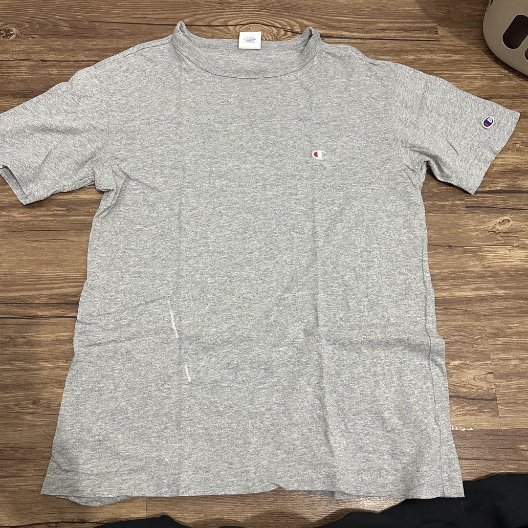 Champion gray shirt (Category: Tshirts & Polo Shirts ) located in Bulacan. Submitted by itemsbyjj (Listing ID 1460437403, Image 2). Description: Issue: white line stain.