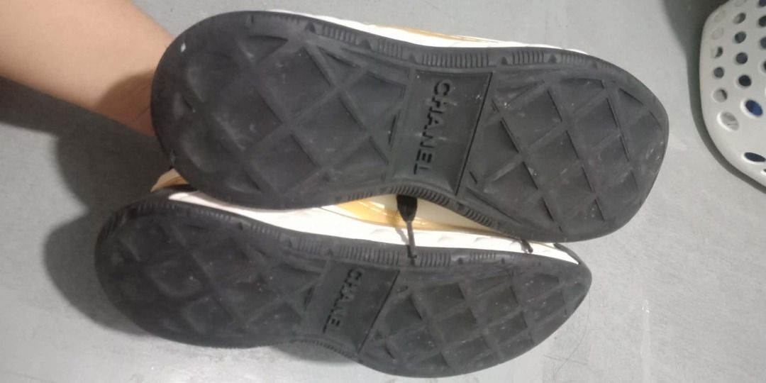 Chanel Sneakers Size 38 (Category: Sneakers) located in Caloocan City. Submitted by mightyflower.edd5ef (Listing ID 1460452791, Image 3). Description: - Authentic Chanel sneakers - Size: 38 - Color: Cream and Black - Features Chanel logo on soles - Comfortable and stylish - Perfect for everyday wear.