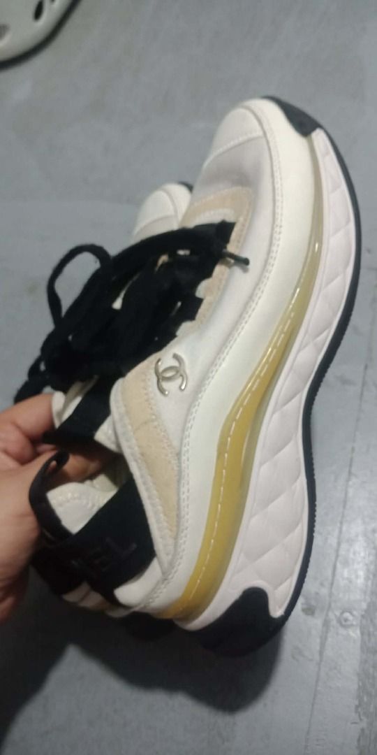 Chanel Sneakers Size 38 (Category: Sneakers) located in Caloocan City. Submitted by mightyflower.edd5ef (Listing ID 1460452791, Image 1). Description: - Authentic Chanel sneakers - Size: 38 - Color: Cream and Black - Features Chanel logo on soles - Comfortable and stylish - Perfect for everyday wear.