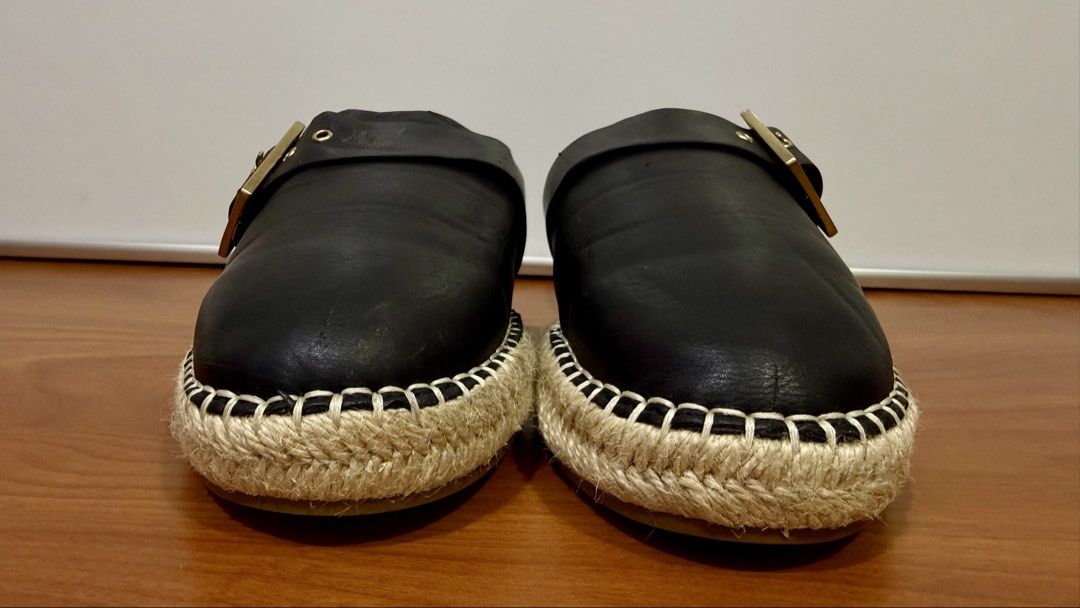 Charles & Keith Black Espadrille Mules (Category: Slippers and slides) located in Binangonan. Submitted by c_r_i_s (Listing ID 1460463911, Image 3). Description: Charles & Keith Black Espadrille Mules Women’s Size 38 and may fit Size 37 Stylish black slip-on mules featuring oversized gold-tone buckles and woven espadrille platform soles. Comfortable, versatile, and easy to pair with casual or smart-casual outfits. * Size: EU 38 * Color: Black * B