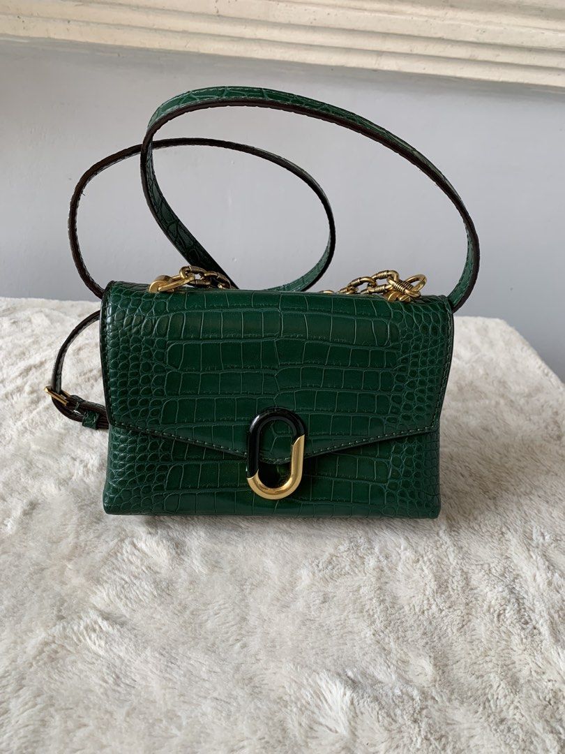 Charles & Keith Green slingbag (Category: Shoulder Bags) located in Taguig. Submitted by madisam (Listing ID 1460320872, Image 1). Description: Brand new original Can fit CP and short wallet .