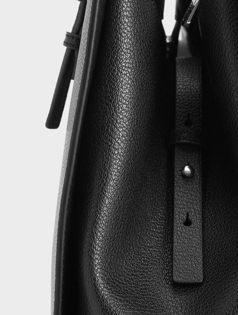 Charles & Keith Sansa Tote Bag - Noir (Category: Shoulder Bags) located in Paranaque City. Submitted by wearbymichelle (Listing ID 1460333899, Image 3). Description: - XL - Black - Has 3 compartments - Adjustable strap - Width: 35 cm - Depth: 12 cm - Height: 30 cm RFS: no longer being used.