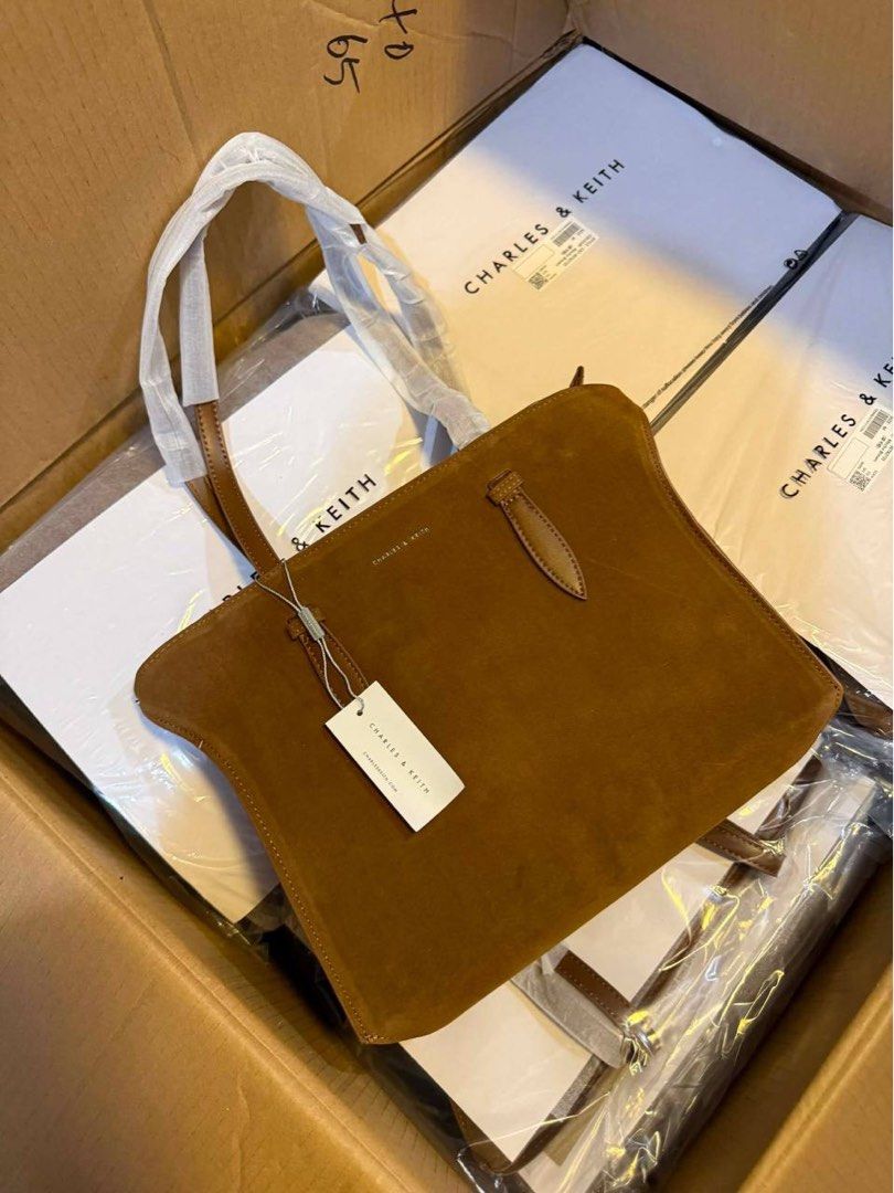 Charles and Keith Bags (Category: Shoulder Bags) located in Manila. Submitted by magicmike08 (Listing ID 1460307861, Image 1). Description: New Arrival 🤍✨ ✅ authentic quality ✅ with dustbag & paperbag ✅ actual photo 💰 ₱1500 only ! Large 📩 PM for orders.