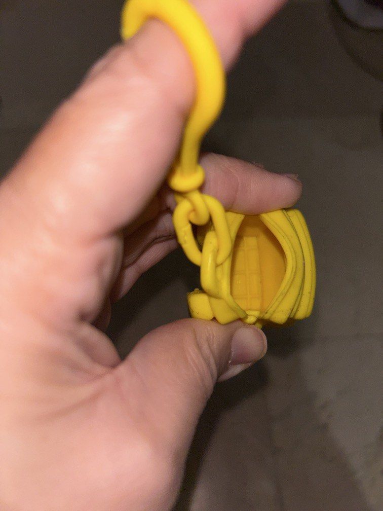 Charm u yellow bag keychain coin purse (Category: Purses & Pouches) located in Manila. Submitted by vintageaccessories (Listing ID 1460445219, Image 2). Description: .