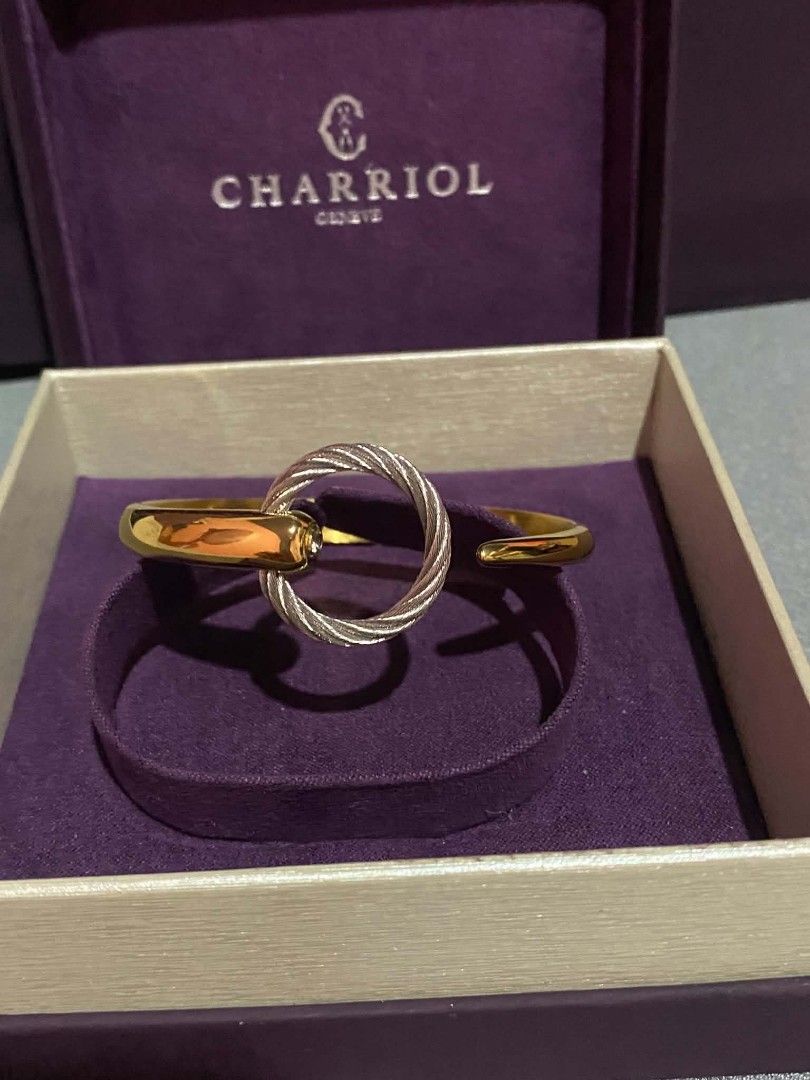 Charriol Geneva Infinity Zen Bangle with Diamond (Category: Bracelets) located in General Trias. Submitted by newberg0211 (Listing ID 1460448610, Image 3). Description: - Authentic Charriol Geneva Infinity Zen Bangle - Elegant gold finish with signature twisted cable design - Features a sparkling diamond accent - Comes with original box and authenticity card - Model Reference: 04-104-1252-03.