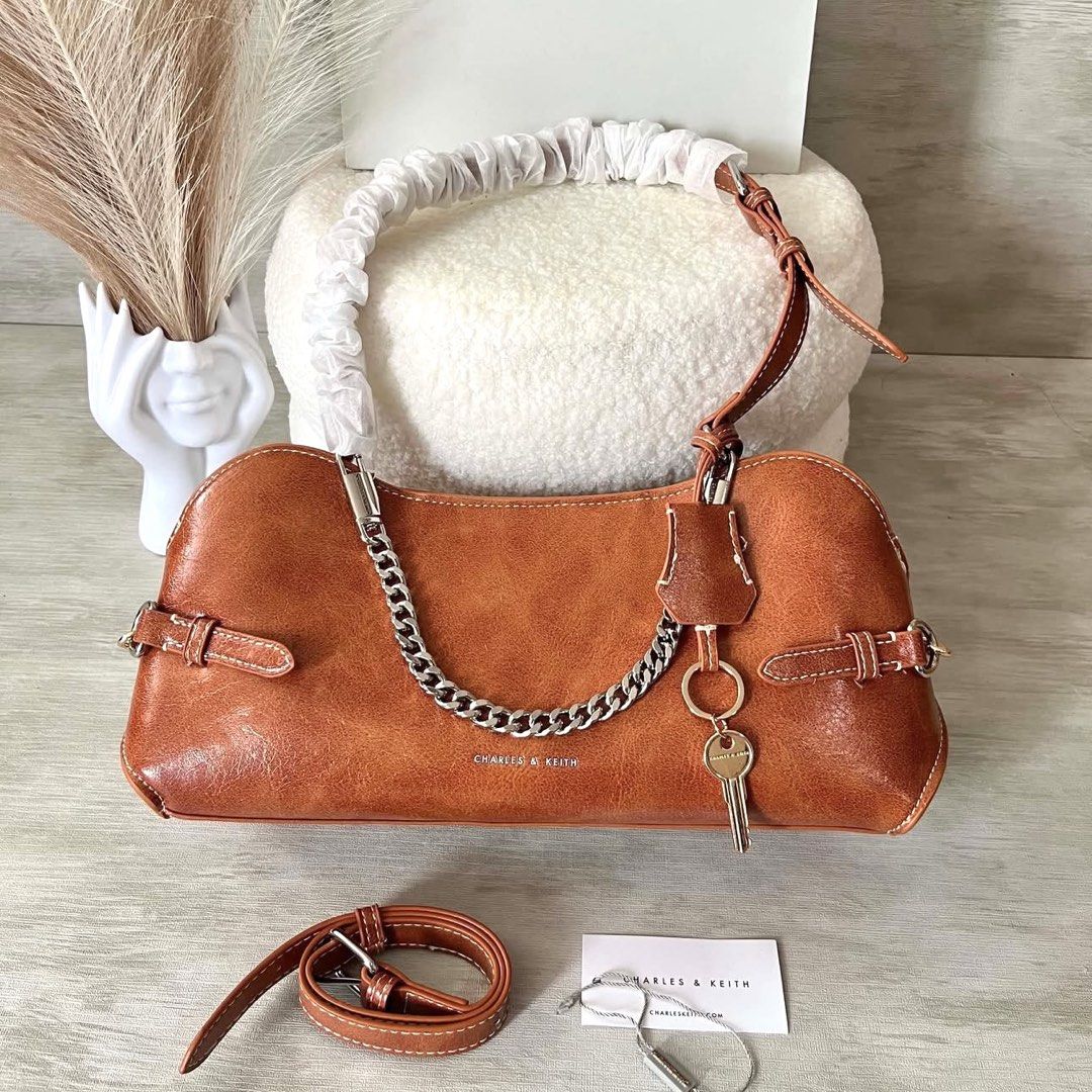 C&K Delfina Canvas Chain Side-Belt Shoulder Bag (Category: Shoulder Bags) located in Bulacan. Submitted by mykakarizza (Listing ID 1460504123, Image 3). Description: NEW✨✨ ₱950 onlyy C&K Delfina Canvas Chain Side-Belt Shoulder Bag Width 29 cm Depth 10.5 cm Height 14 cm Add paperbag 100 📸 Actual pics! 🙋🏻‍♀️ ─── ✦ ─── ✦ ─── ✦ ─── ✦ ─── 🛍️ LOOKING FOR MORE RESELLERS 🛍️ ✨ Buy 3 pcs of ANY items — FREE SHIPPING NA!🚚 ✨ Buy 10 items → FREE SF + ₱5