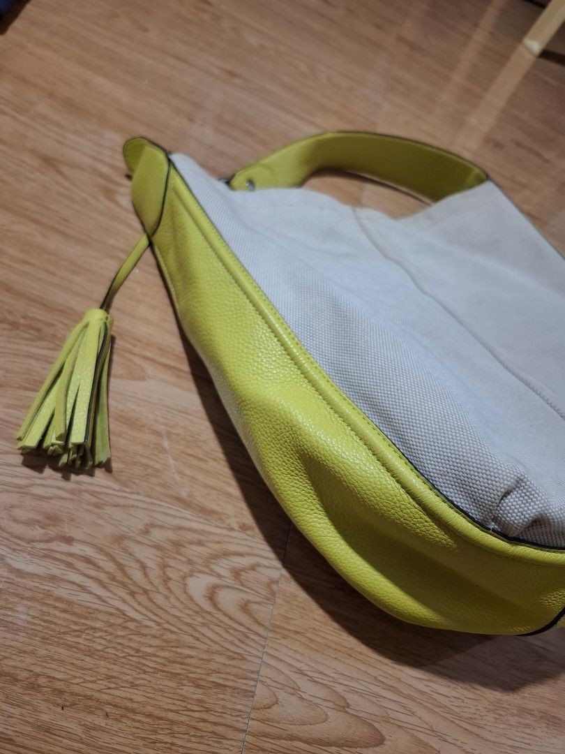 Coach Avery Hobo Bag (Free SF) (Category: Luxury Bags & Wallets) located in Baguio. Submitted by bycharmaebuys (Listing ID 1460460993, Image 3). Description: Coach Avery hobo bag Guaranteed Authentic 💯 NOT UKAY, PERSONAL PRELOVED ‼️ SALE PRICE: 1500.00, FREE SHIPPING NATIONWIDE‼️ Orig Price: 3000.00 First to pay basis Dimension: 13" by 12" Canvas material with Leather Trimmings Natural canvas with lemon yellow color Silver hardware Magnetic Snap