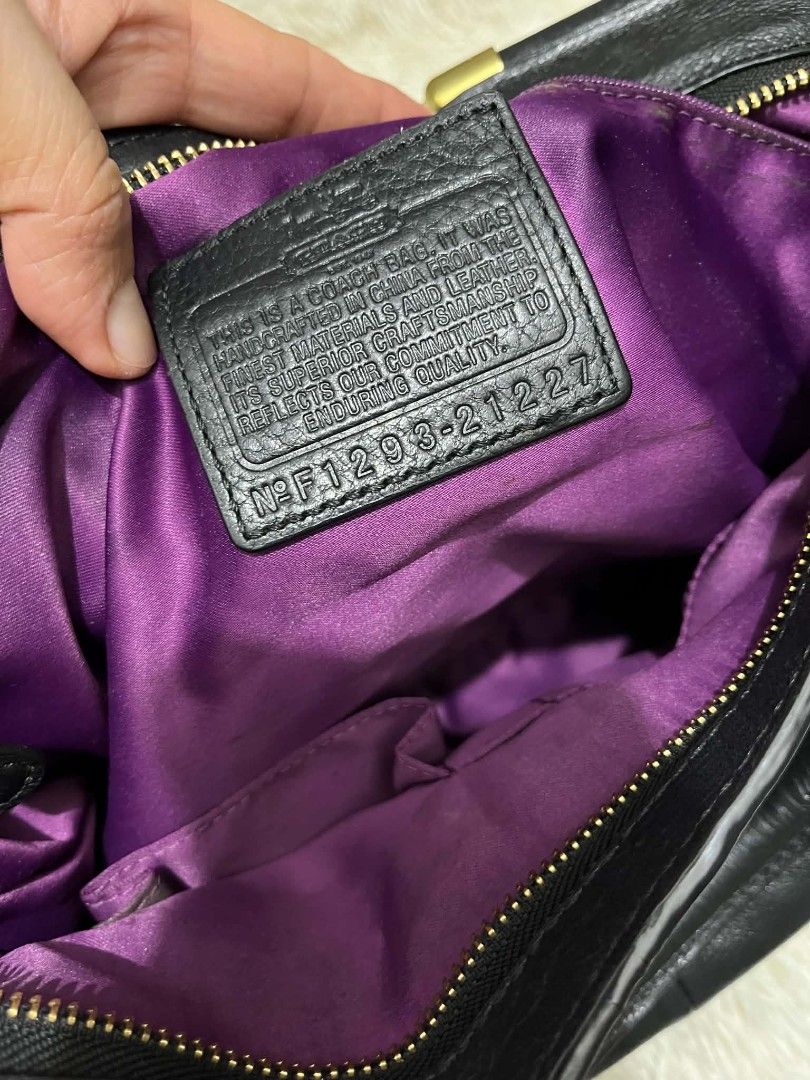 Coach Black Leather Handbag (Category: Shoulder Bags) located in Imus. Submitted by desvasquez (Listing ID 1460350858, Image 2). Description: - Genuine black leather Coach handbag - Elegant gold hardware accents - Luxurious purple satin interior lining - Spacious design, perfect for everyday use - Comes with original tag - excellent condition - med size - no flaws - guaranteed OG.