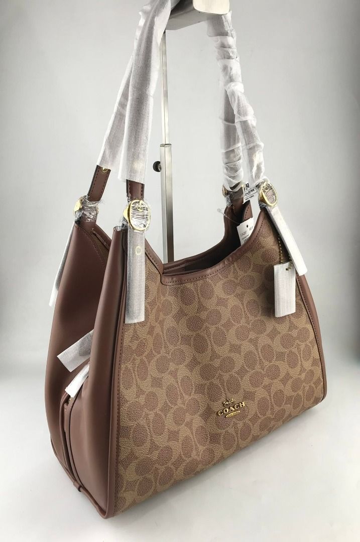 Coach Erin Shoulder Bag (Category: Shoulder Bags) located in Manila. Submitted by msddirectfactoryoutlet (Listing ID 1460360196, Image 3). Description: Erin Shoulder Bag L: 12.25" H: 10.25" W: 5.5" US Grade 100%.