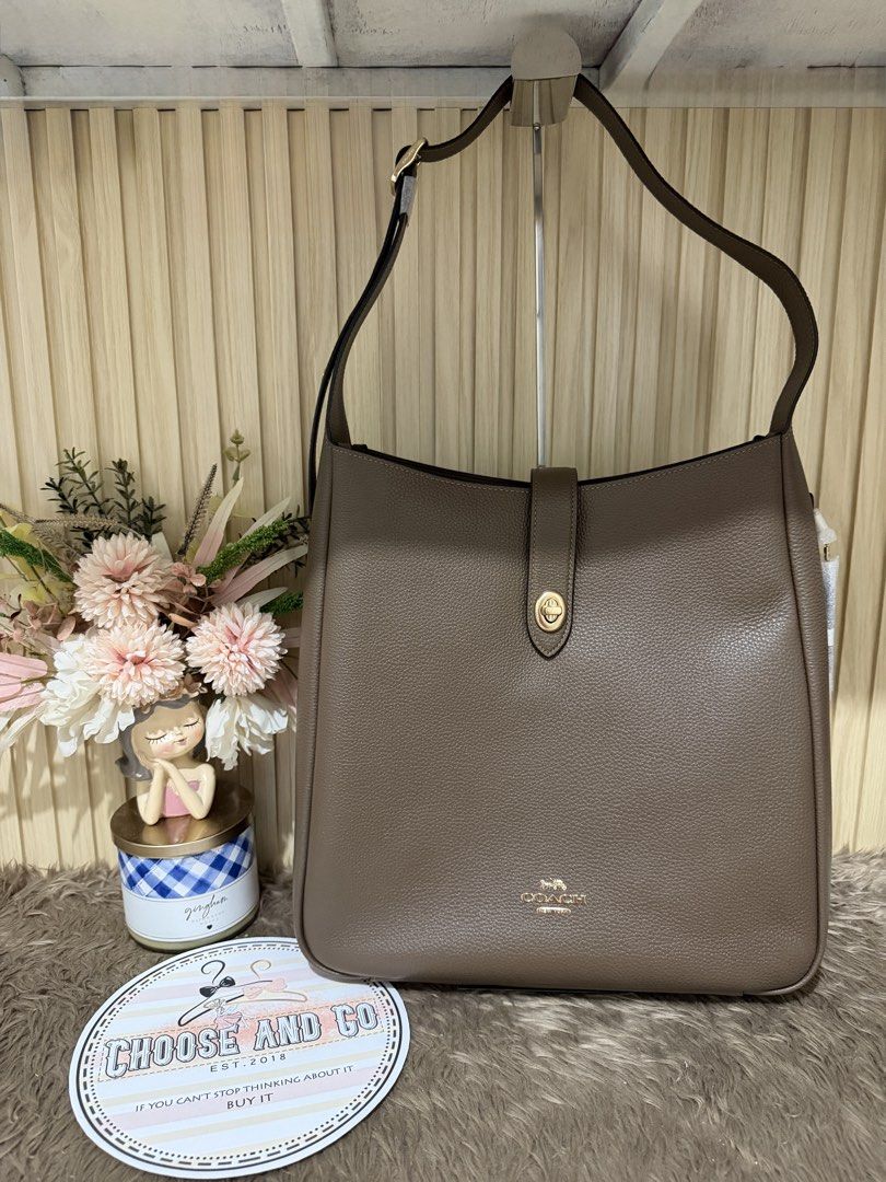 COACH HADLEY LARGE SHOULDER BAG - DARKSTONE (Category: Shoulder Bags) located in Cabanatuan. Submitted by chooseandgo (Listing ID 1460305823, Image 1). Description: AVAILABLE, FRESH FROM THE ✈️ 🌸 CO@CH HADLEY LARGE SHOULDER BAG - DARKSTONE 🌸 See photos for inclusions (Tag, carecard and poly plastic) -------------------------------------------------- • PINAS ONAHD NA PO(Shipping via LBC) • 💯Guaranteed Original/Authentic, Money back guaranteed i