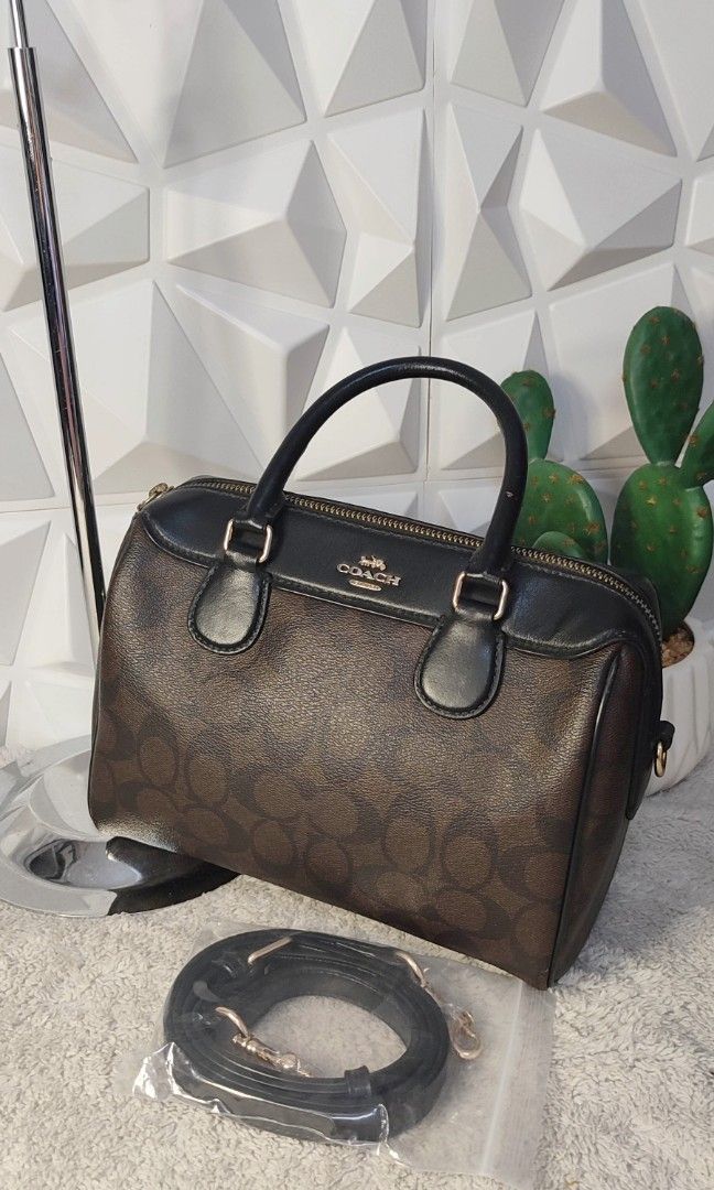 Authentic Coach Mini Bennett Satchel in Signature Canvas (Category: Clutches) located in Pasig City. Submitted by cezcille21 (Listing ID 1460433095, Image 2). Description: office bag made in cambodia Ideal Zipper Searchable code note : No strap but I can provide high quality replacement po. Add lang 300.