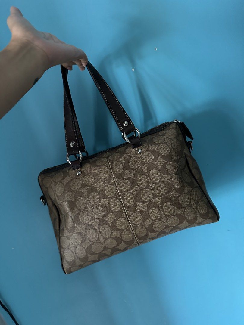Coach Monogram Canvas Leather Trim Satchel Bag (Category: Luxury Bags & Wallets) located in Manila. Submitted by mikaysabel (Listing ID 1460447089, Image 3). Description: - Authentic Coach monogram satchel bag - Genuine leather trim and handles - Secure zipper closure - Includes detachable shoulder strap - Spacious, lined interior - Ideal for everyday use.