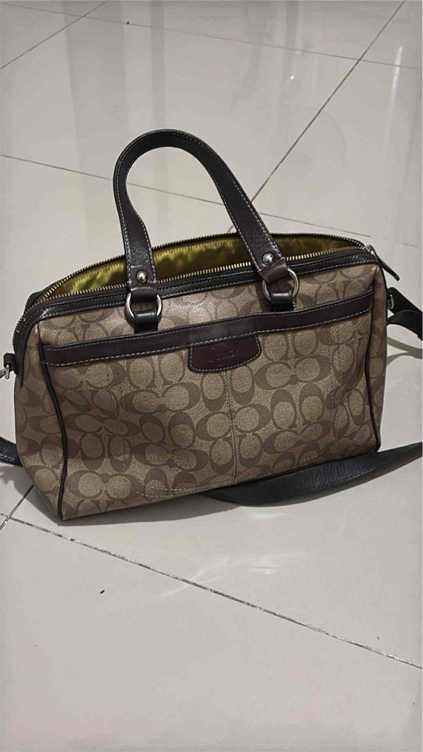 Coach Monogram Canvas Leather Trim Satchel Bag (Category: Luxury Bags & Wallets) located in Manila. Submitted by mikaysabel (Listing ID 1460447089, Image 1). Description: - Authentic Coach monogram satchel bag - Genuine leather trim and handles - Secure zipper closure - Includes detachable shoulder strap - Spacious, lined interior - Ideal for everyday use.