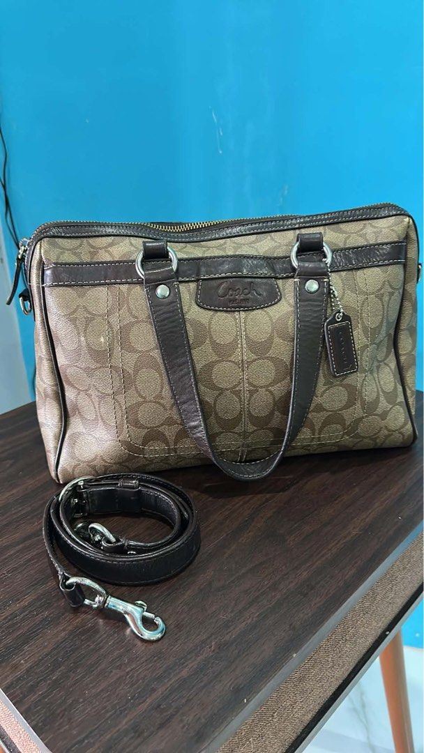 Coach Monogram Canvas Leather Trim Satchel Bag (Category: Luxury Bags & Wallets) located in Manila. Submitted by mikaysabel (Listing ID 1460447089, Image 2). Description: - Authentic Coach monogram satchel bag - Genuine leather trim and handles - Secure zipper closure - Includes detachable shoulder strap - Spacious, lined interior - Ideal for everyday use.