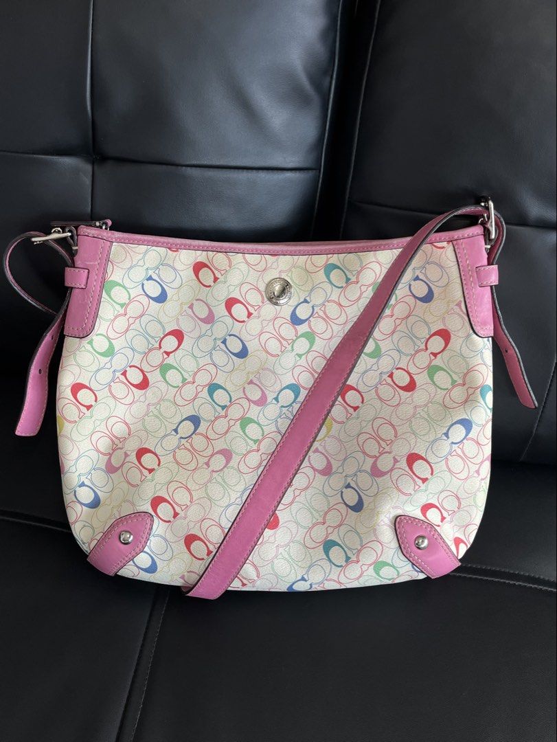COACH MULTICOLOR CHELSEA HOBO (Category: Luxury Bags & Wallets) located in San Fernando. Submitted by archivalhighlights (Listing ID 1460393023, Image 2). Description: COACH MULTICOLOR CHELSEA HOBO Condition:9.8/10 No major flaws Flaw: Signs of Wear (See photo) Zipper: YKK Material:Canvas Hardware: Silver -Tone nickle Era:2010 / 2011 Size: Medium Measurements: Width: 12 inches Height: 11 to 12 inches Depth: 2 to 3 inches.