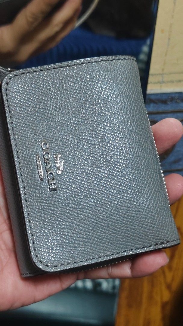 Coach Small Zip Around Wallet - Grey Pebble Leather (Category: Wallets & Card holders) located in Davao. Submitted by warmdeer-4ae1 (Listing ID 1460462305, Image 2). Description: - Brand: Coach - Material: Grey pebble leather - Style: Small zip around wallet - Features: Side coin zip pocket, ample card slots, bill compartments - Hardware: Silver - Size: Good for everyday use.
