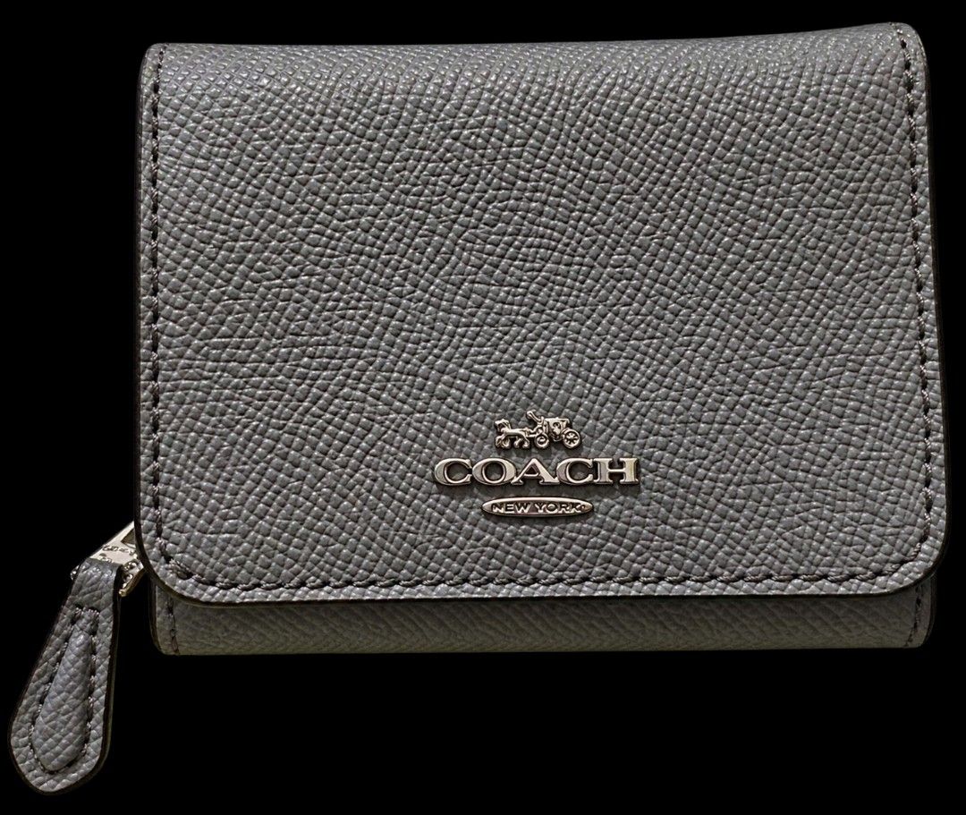 Coach Small Zip Around Wallet - Grey Pebble Leather (Category: Wallets & Card holders) located in Davao. Submitted by warmdeer-4ae1 (Listing ID 1460462305, Image 1). Description: - Brand: Coach - Material: Grey pebble leather - Style: Small zip around wallet - Features: Side coin zip pocket, ample card slots, bill compartments - Hardware: Silver - Size: Good for everyday use.
