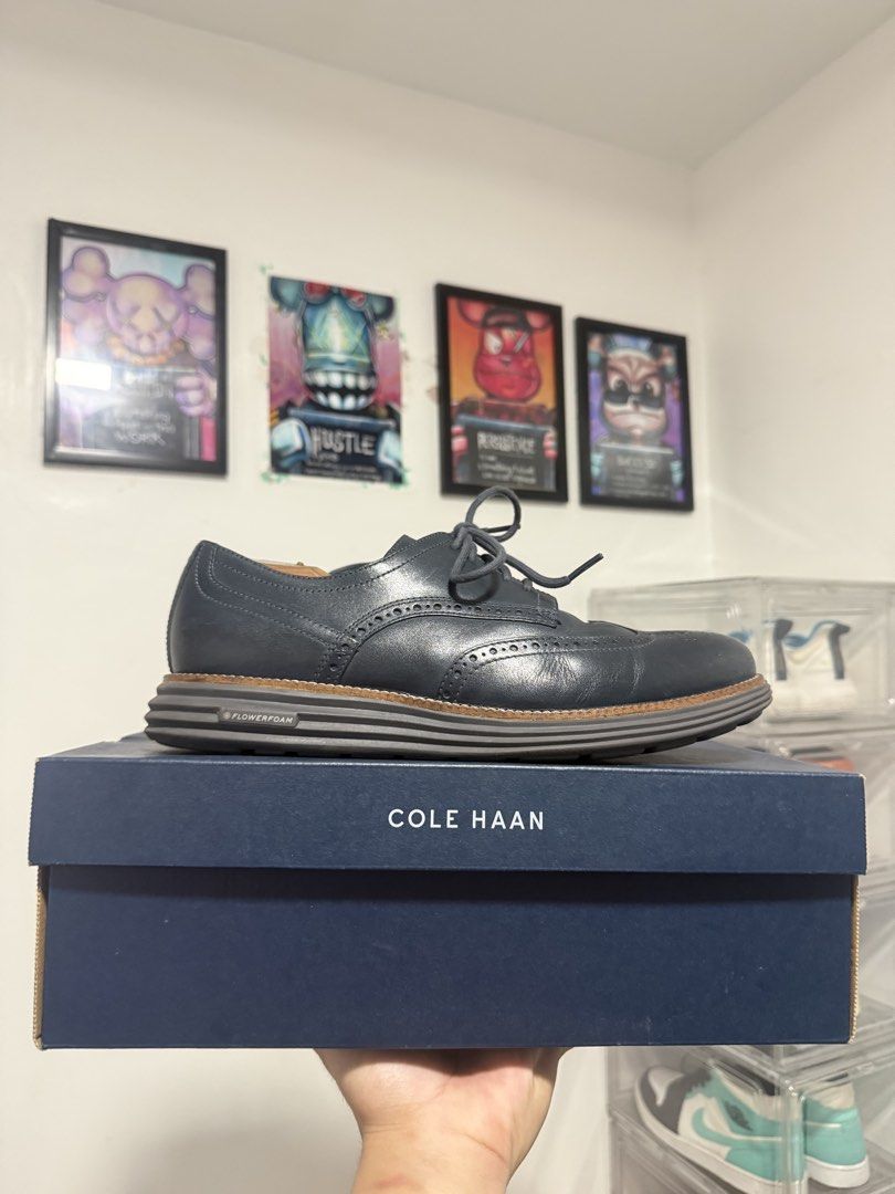 Cole Haan Grand 360 Design & Engineering Oxfords (Category: Dress Shoes) located in Manila. Submitted by riyhun (Listing ID 1460367566, Image 1). Description: - Cole Haan Oxfords - Color: Dark Blue/Grey - Style: Wingtip Brogue Detailing - Closure: Lace-up - Sole: Comfortable FlowerFoam - Includes: Original Box and Shoe Trees - Versatility: Perfect for dressing up or down.