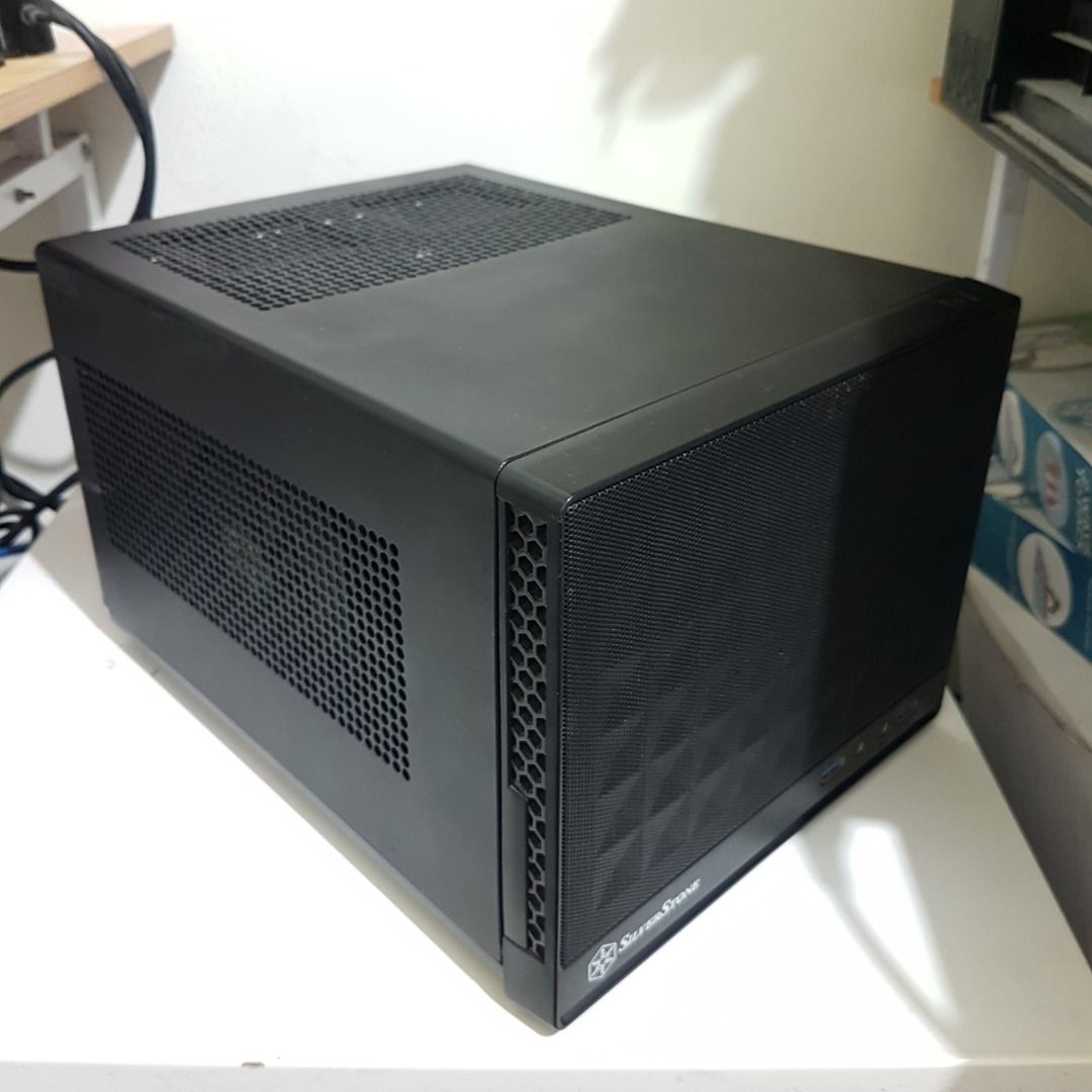 Computer Case - Silverstone Sugo 13 Black Color (ITX Size Only) (Category: Computer Parts) located in Bulacan. Submitted by blitzwing28 (Listing ID 1460491490, Image 1). Description: = NOTE = - Item is in good condition. Item compatibility is buyer's responsibility! - No return, no exchange policy. - The computer case is only for sale. Other computer parts shown in the pictures are for reference purposes only and they're NOT for sale. - Item has 