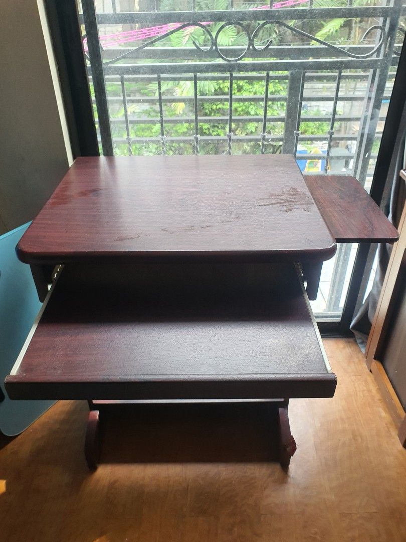 Computer Table (Category: Tables & Sets) located in Paranaque City. Submitted by nicessities (Listing ID 1460384012, Image 2). Description: - Computer table - Classic wood finish - Functional design - Suitable for study or work *table heavy and very sturdy *some chips only, laminate peeled off see pix *pinatungan lang ng damit most times 😅 2k only. Buyer to arrange and shoulder transport costs from near Rogationist College Paranaque .
