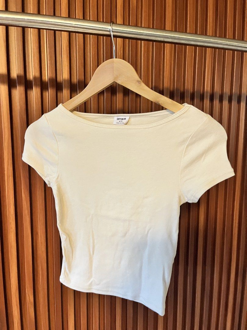 Cotton On Cropped T-shirt (Category: Shirts) located in Echague. Submitted by aeafitz (Listing ID 1460362727, Image 1). Description: - Brand: Cotton On - Style: Basic cropped t-shirt - Neckline: Boat neck - Sleeves: Short sleeves - Fit: Snug - Versatility: Great for layering or wearing on its own - Styling: Easy to pair with any outfit.