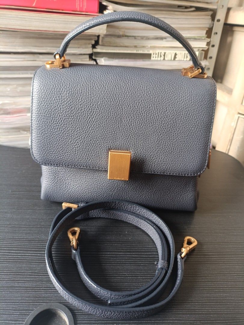 COURONNE SHOULDER BAG (Category: Cross-body Bags) located in Quezon City. Submitted by collectandselect (Listing ID 1460368028, Image 1). Description: COURONNE SHOULDER BAG GRAY LEATHER ⚠️FIRM PRICE! Lowballing Offers will be Ignored! ⚠️These are OLD PRE-LOVED ITEMS! So Please Manage your Expectations! ⚠️Expect Creases Due to Age and Storage! ⚠️1st TO PAY GETS THE ITEM(S)! ⚠️ I HAVE THE RIGHT TO CHOOSE MY BUYER(S) AT MY CONVENIENCE! ⚠️WHAT YOU SE