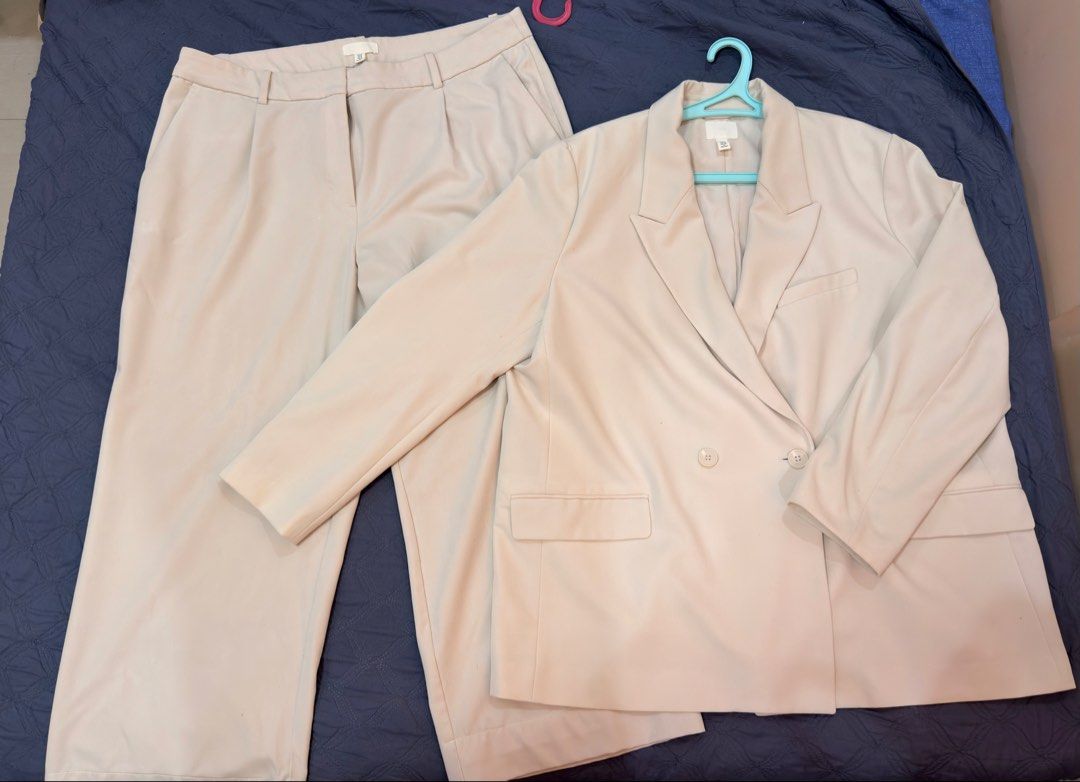 Cream Double-Breasted Blazer and Trousers Set (Category: Coats, Jackets and Outerwear) located in Manila. Submitted by avyandrea (Listing ID 1460479565, Image 1). Description: - cream blazer and matching pants set - Blazer: Double-breasted, 2-button closure - Pants: Relaxed fit, pleated design - Versatile for smart casual to formal looks - Ideal for office wear or special events - Easily dressed up or down.