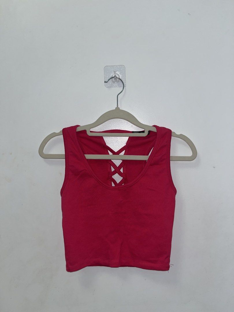 Criss-Cross Back Crop Tank Top (Small to Medium) (Category: Sleeveless) located in Binmaley. Submitted by thegirlscloset1 (Listing ID 1460461563, Image 1). Description: Cute red crop tank top with a stylish criss-cross back detail. Sleeveless, stretchy, and perfect for casual wear with jeans or shorts..