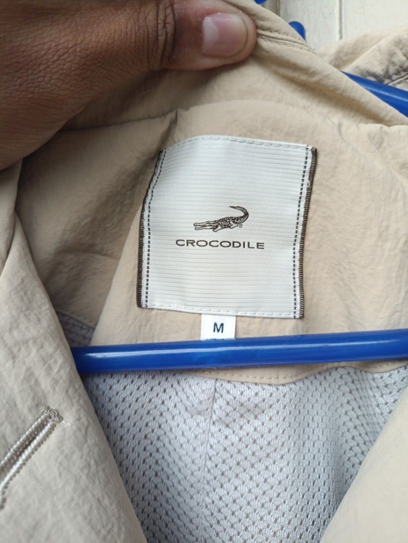 CROCODILE BEIGE JACKET (Category: Coats, Jackets and Outerwear) located in Quezon City. Submitted by collectandselect (Listing ID 1460418889, Image 1). Description: - Beige Crocodile Jacket - Size: Medium (M) - Classic button-up front - Collared neckline - Lightweight material, ideal for layering - Versatile for casual wear or as a light outer layer.