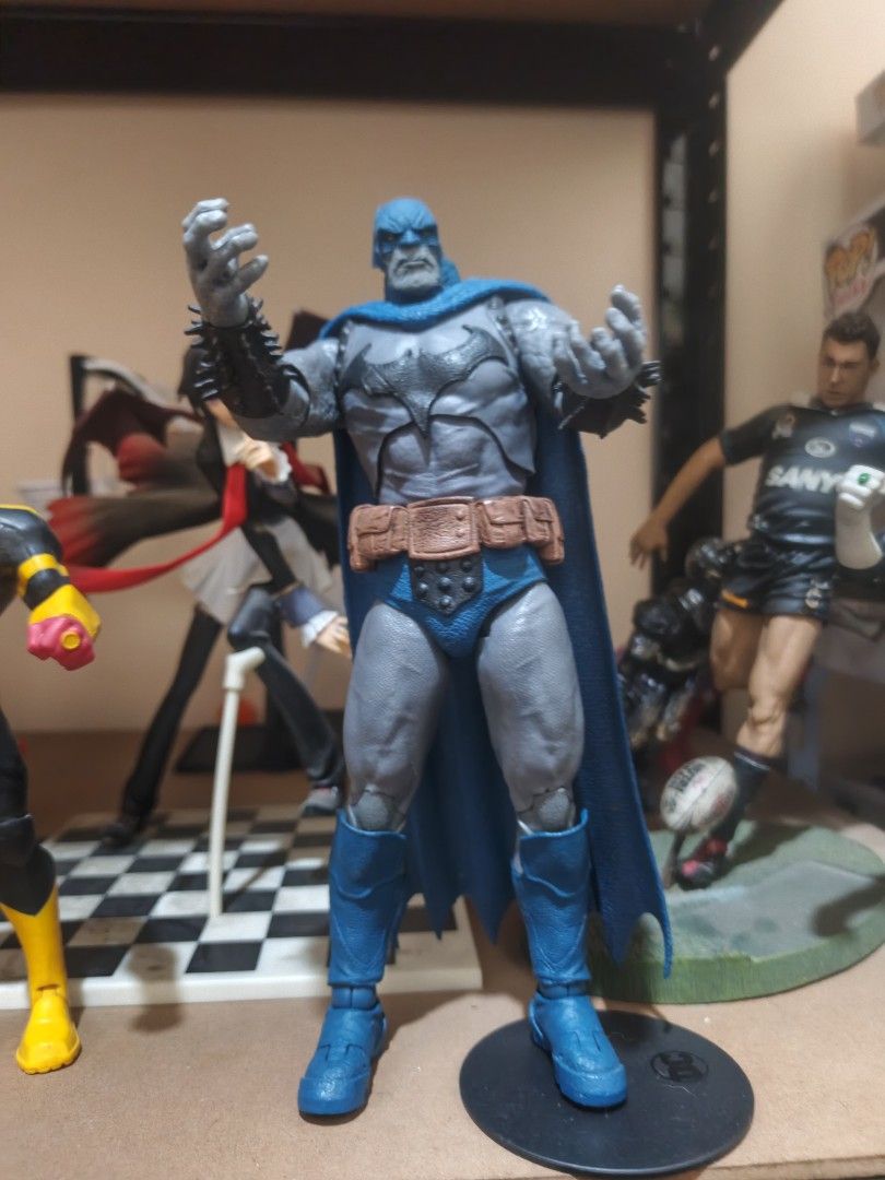 Dark father BAF DC (Category: Figurines & Statues) located in Antipolo. Submitted by kingofpaps (Listing ID 1460423546, Image 1). Description: - DC Multiverse Batman Action Figure - Features a blue cape and cowl - Grey and blue suit design - Brown utility belt -Dark father -BAF - Includes a black display base - Other figures in background are for display purposes only and not included..