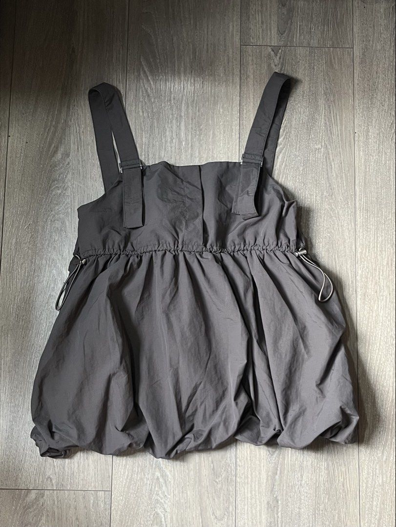 Dark Gray Bubble Hem Sleeveless Top (Category: Sleeveless) located in Mandaluyong City. Submitted by namislounge (Listing ID 1460369541, Image 1). Description: Super cute!! Best fits medium - semi large - Grey strappy top - Gathered elastic waist - Bubble hem shape - Adjustable straps - Waist can be cinched - Lightweight material - Perfect for layering or wearing alone.