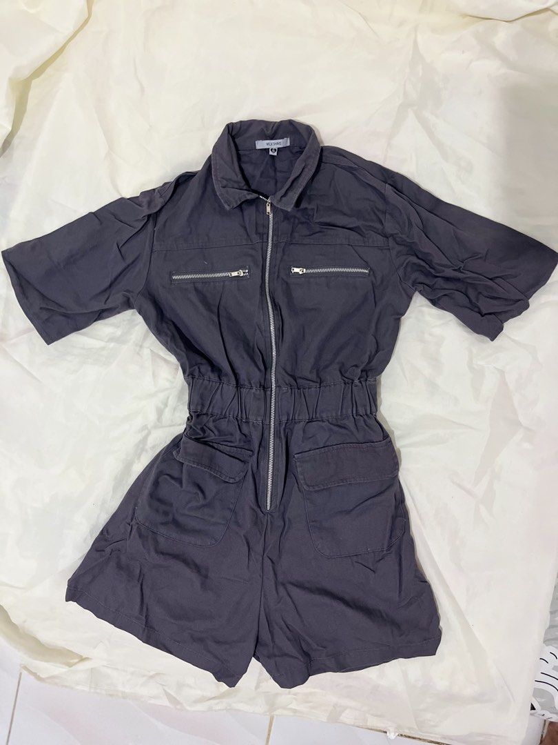 dark gray romper / jumpsuit (Category: Jumpsuits) located in Rizal. Submitted by le.pln (Listing ID 1460344191, Image 3). Description: bought from department store never used 😭 loc: rizal mod: jnt mop: gcash / bdo.