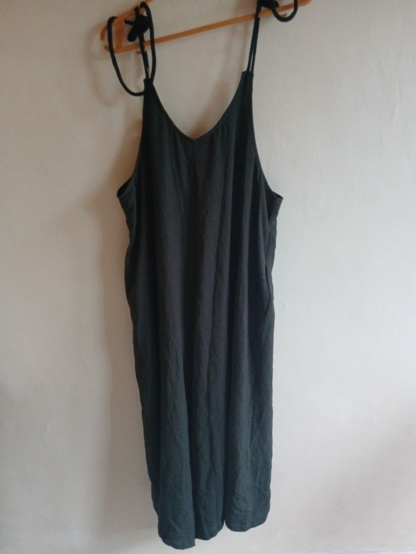 Dark Green Spaghetti Strap Maxi Dress (Category: Dresses) located in Tayabas. Submitted by ahrcelllego (Listing ID 1460319003, Image 1). Description: - Dark green maxi dress - Spaghetti straps - Beautiful fabric drape and texture - Simple, flowy design - Versatile for casual or dressed-up occasions - Easy to style.
