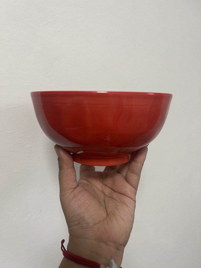 Decorative Ceramic Bowl with Intricate Pattern (Category: Vases & Decorative Bowls) located in Dasmarinas. Submitted by purpleboxmidori (Listing ID 1460471930, Image 2). Description: - Beautiful ceramic bowl with a vibrant, detailed pattern. - Solid red exterior. - Approximately 20cm in diameter. - Ideal for serving food or as a decorative accent. - Adds a pop of color to your table. - Dishwasher safe for easy cleaning..