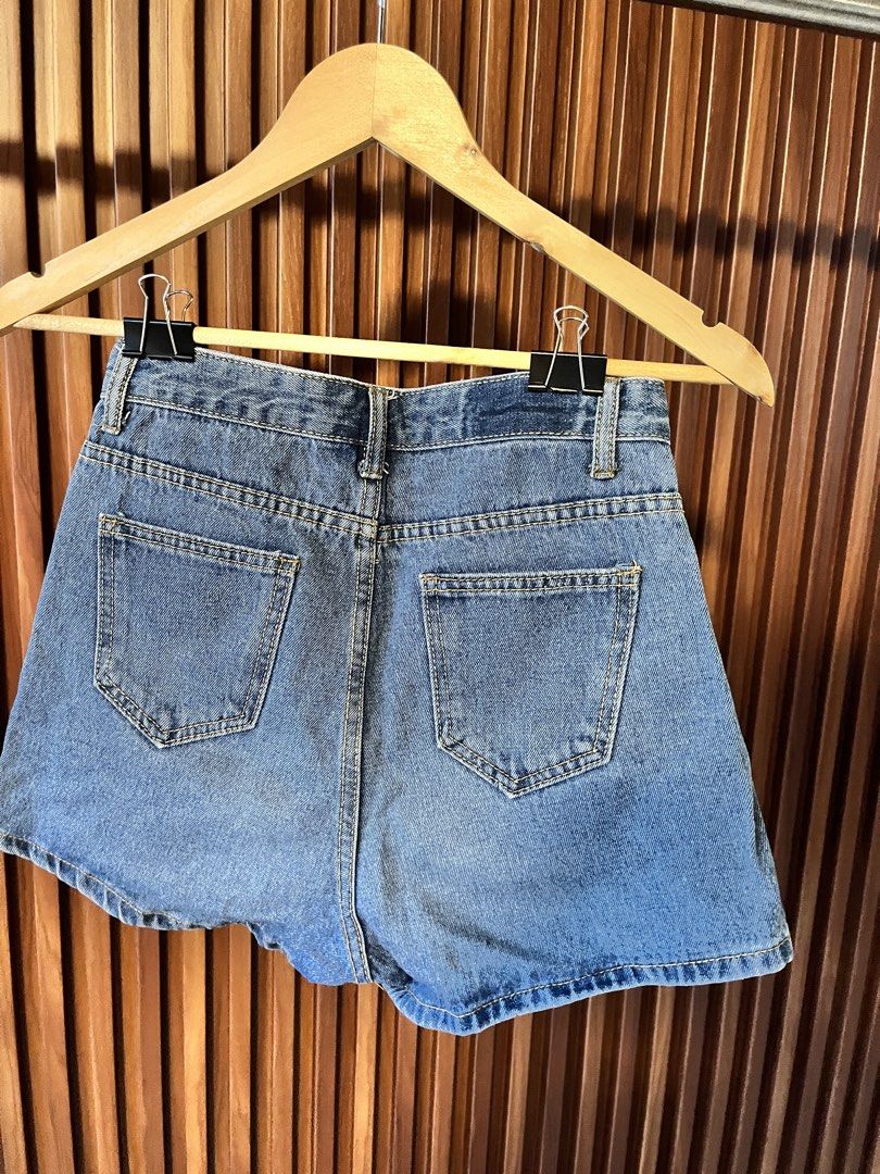 Denim Skort (Category: Shorts) located in Echague. Submitted by aeafitz (Listing ID 1460361951, Image 2). Description: - Light wash denim shorts - High-waisted fit - Classic five-pocket design - Button and zip closure - Frayed hem detail - Ideal for casual wear - Versatile addition to your wardrobe size 25-26.