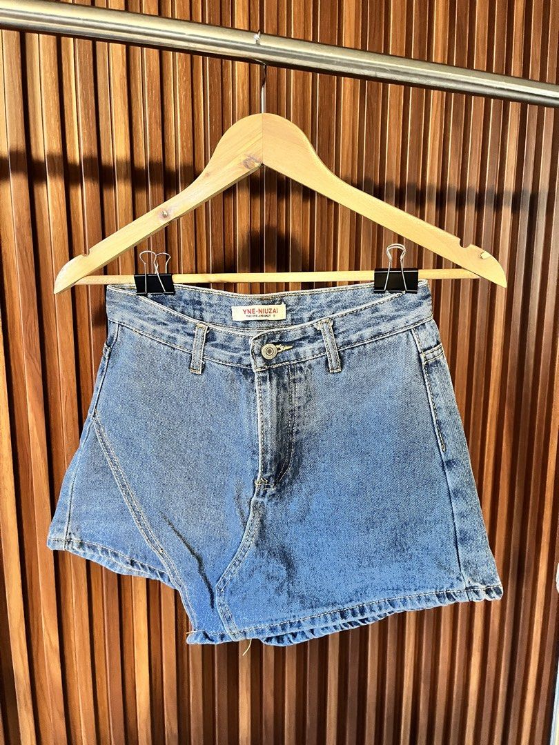 Denim Skort (Category: Shorts) located in Echague. Submitted by aeafitz (Listing ID 1460361951, Image 1). Description: - Light wash denim shorts - High-waisted fit - Classic five-pocket design - Button and zip closure - Frayed hem detail - Ideal for casual wear - Versatile addition to your wardrobe size 25-26.