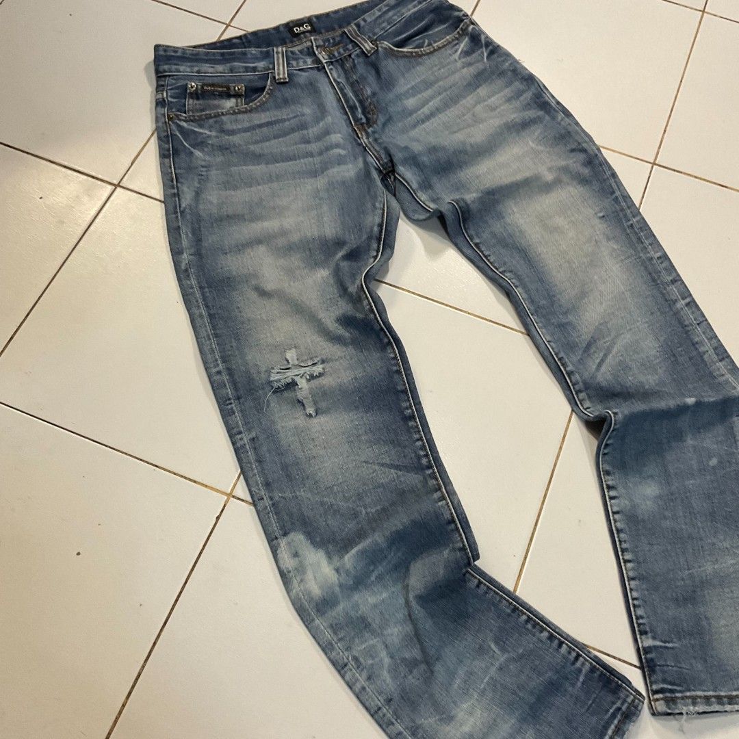 D&G Jeans Distressed Blue Denim (Category: Jeans) located in Morong. Submitted by rusty.vault (Listing ID 1460457209, Image 3). Description: - Authentic Blue D&G Jeans - Distressed wash with stylish rips and fading - Classic button fly closure - Unique stitching details on back pockets - Ideal for a cool, casual look.