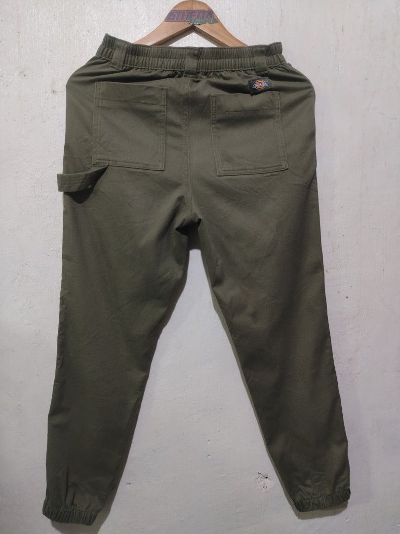 Dickies military Green Carpenter Pants (Category: Joggers) located in Rizal. Submitted by gmpastoffi75031 (Listing ID 1460502945, Image 1). Description: - military green Dickies jogger pants -dimes waist 28-32 length 37 - Elastic cuffs and waistband with button/zip closure - Two front pockets and two back pockets - Convenient carpenter loop on the side - Comfortable and relaxed fit.